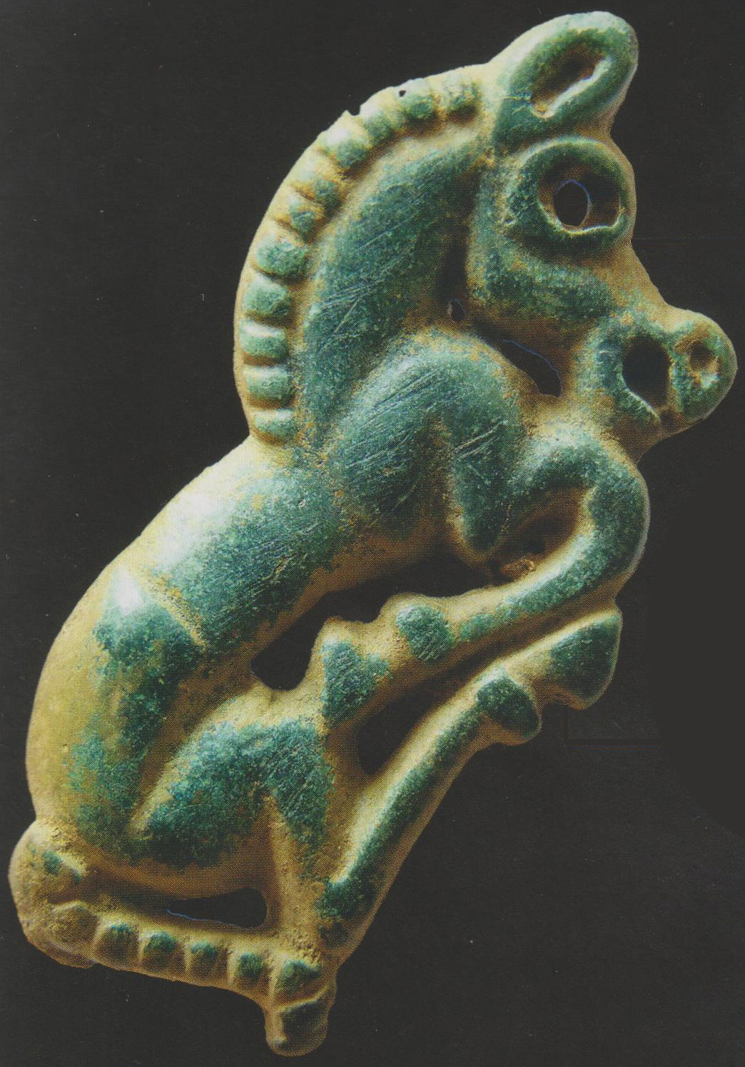 Applique en bronze représentant un cheval.