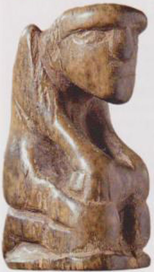 Pion d'un jeu d'échecs figuratif en os.